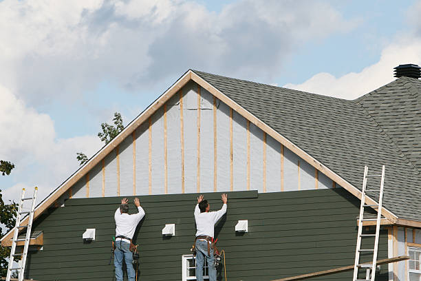 Professional Siding technician working in Quarryville, PA